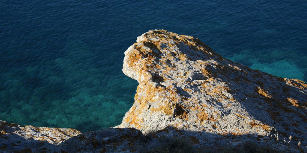 Rocks Over Clear Water on the Island of Patmos