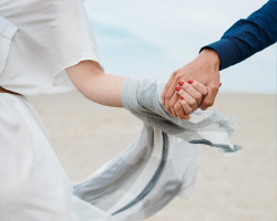 Christian Couple Holding Hands On Vacation