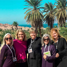 Christian Group Of Women In Saudi Arabia Palm Trees and sea in background thumbnail
