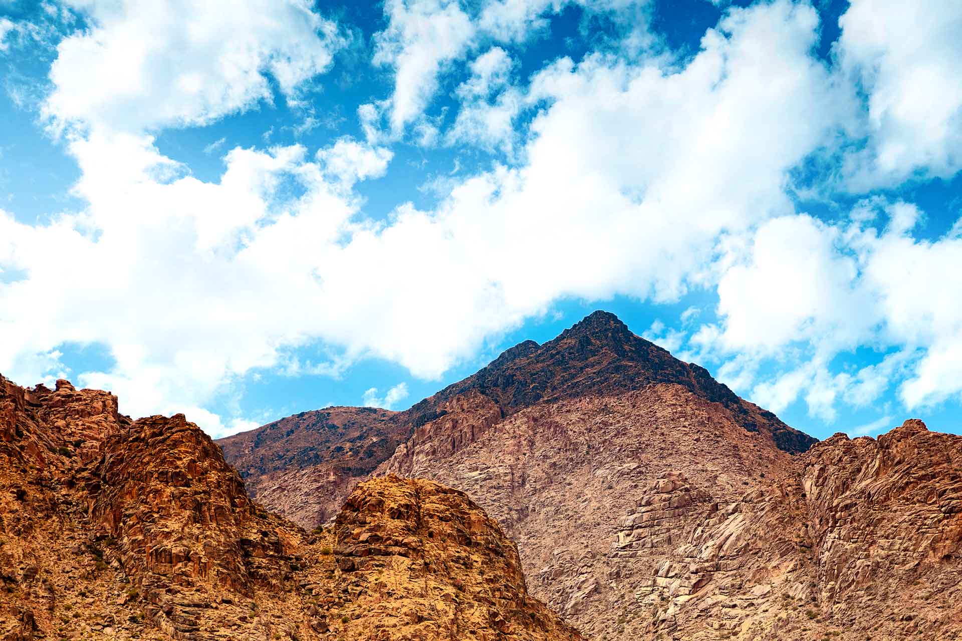 Mount Sinai In Saudi Arabia Burnt Blackened Peak With Blue Skies Living Passages Tour