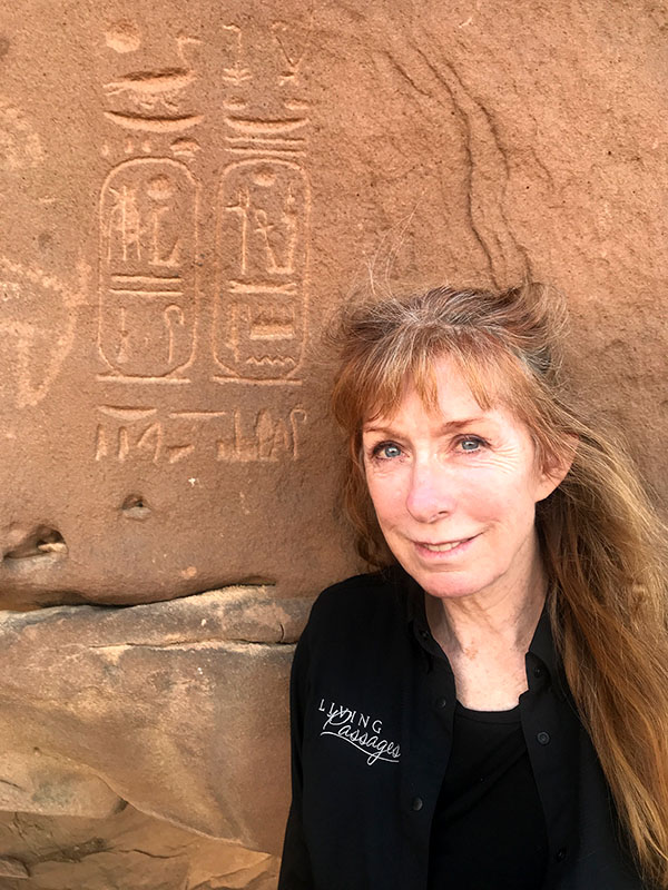 woman with saudi arabia stone inscriptions