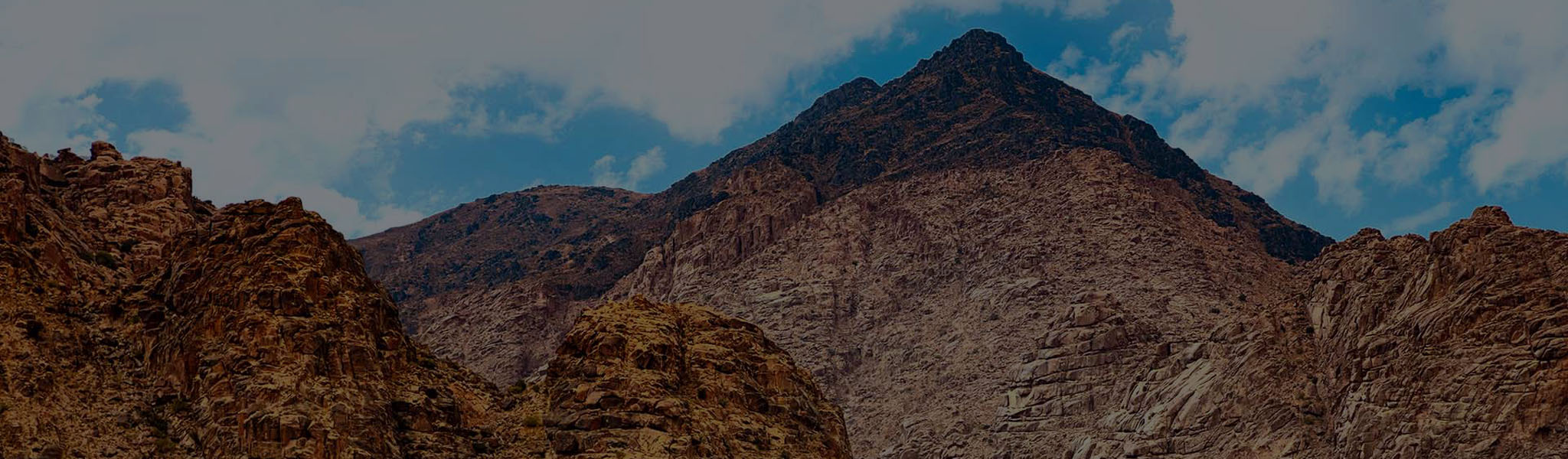 Mount Sinai In Saudi Arabia Burnt Blackened Peak With Blue Skies Living Passages Tour dark