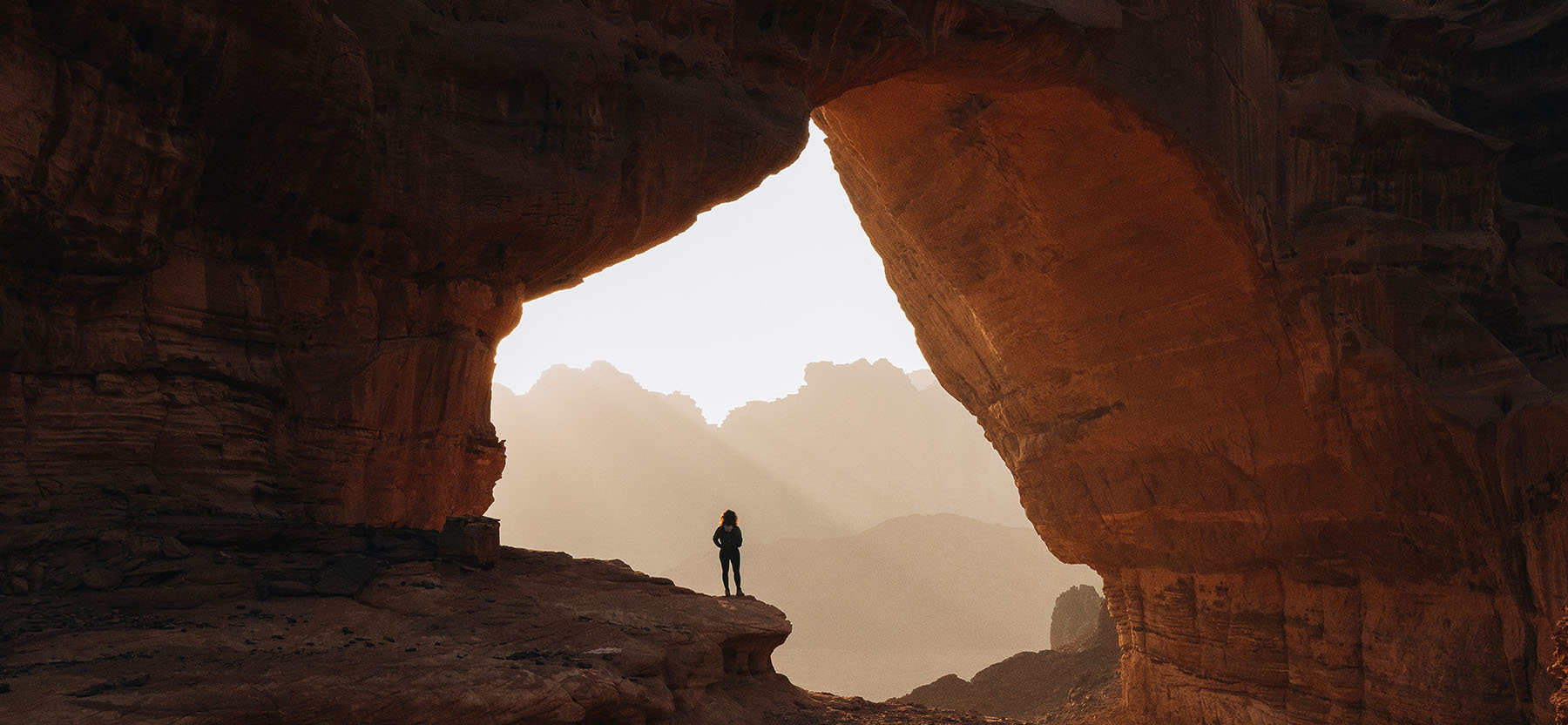Natural rock bridge in the Hisma Desert – NEOM, Saudi Arabia unsplash