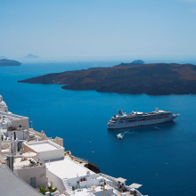 cruise boat in harbor Santorini Greece unsplash