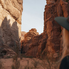 saudi arabia woman in canyon unsplash