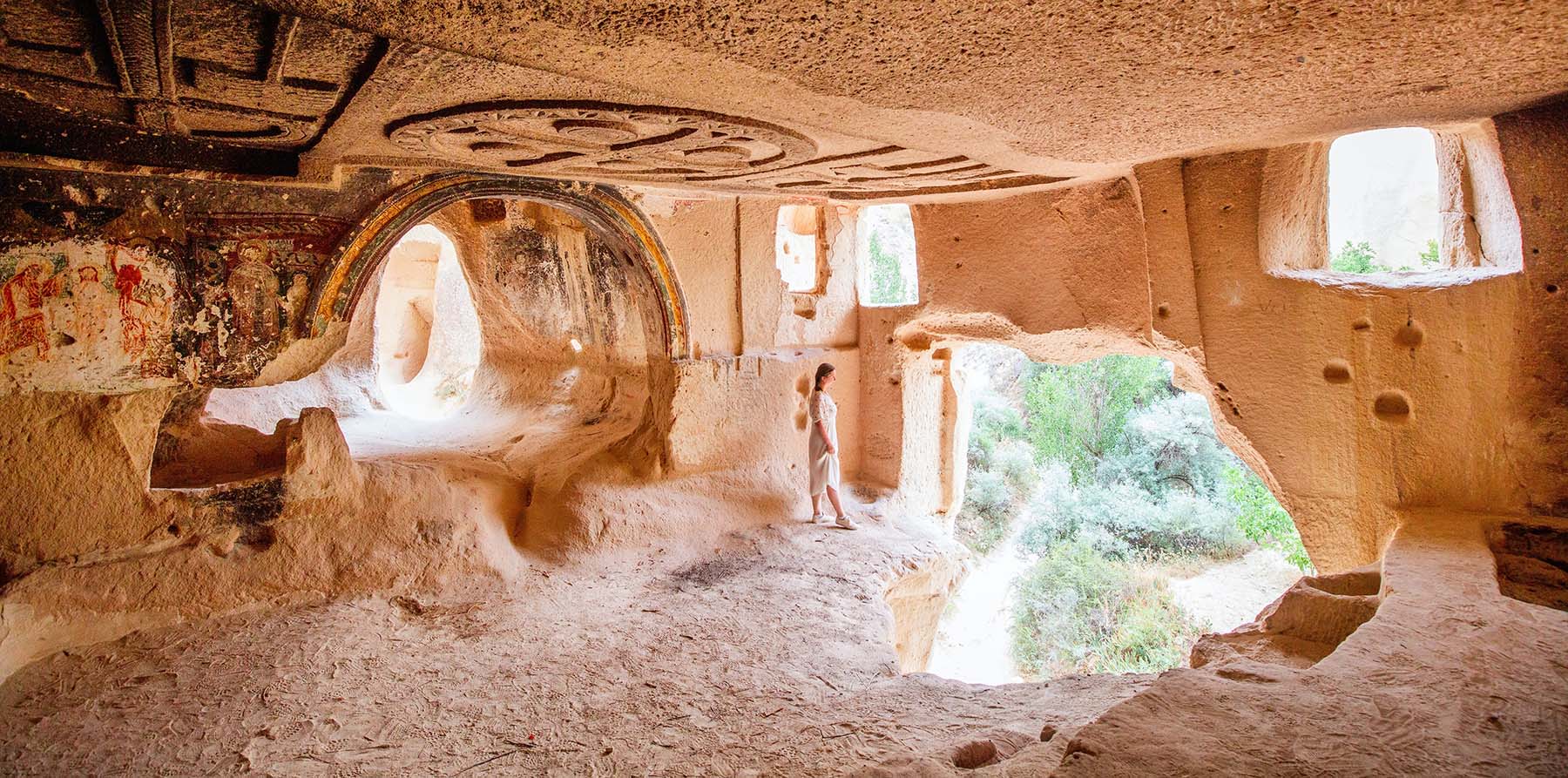 woman in cave cappadocia turkey