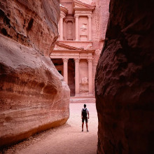 traveler at the entrance to petra jordan unsplash copy