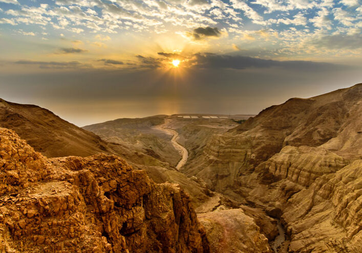 Sunrise over the Dead Sea and the desert wadi of Nahal Dragot